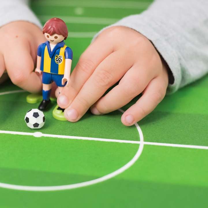 person playing minifig soccer sliding puzzle online