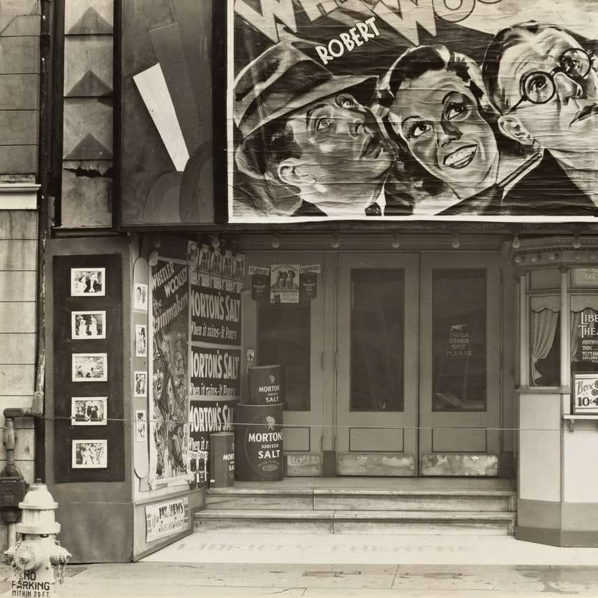 grayscale photography of storefront online puzzle