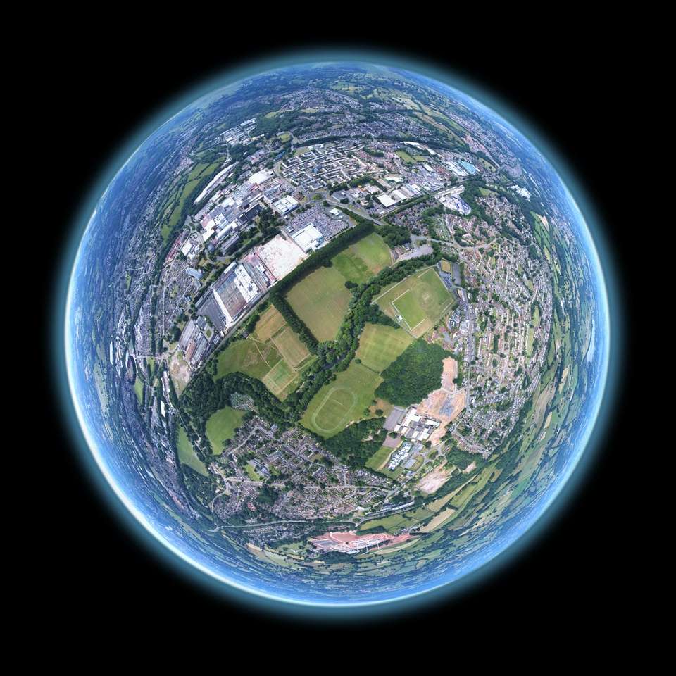 fish-eye aerial shot of buildings and trees online puzzle