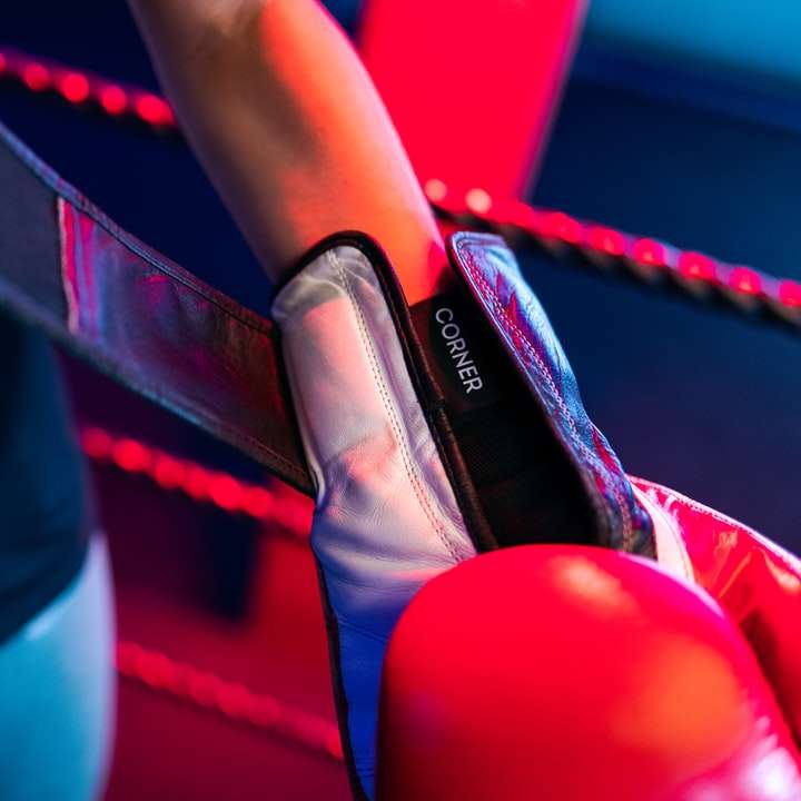 Female boxer puts on performance tracking device sliding puzzle online