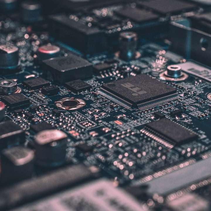 macro photography of black circuit board online puzzle