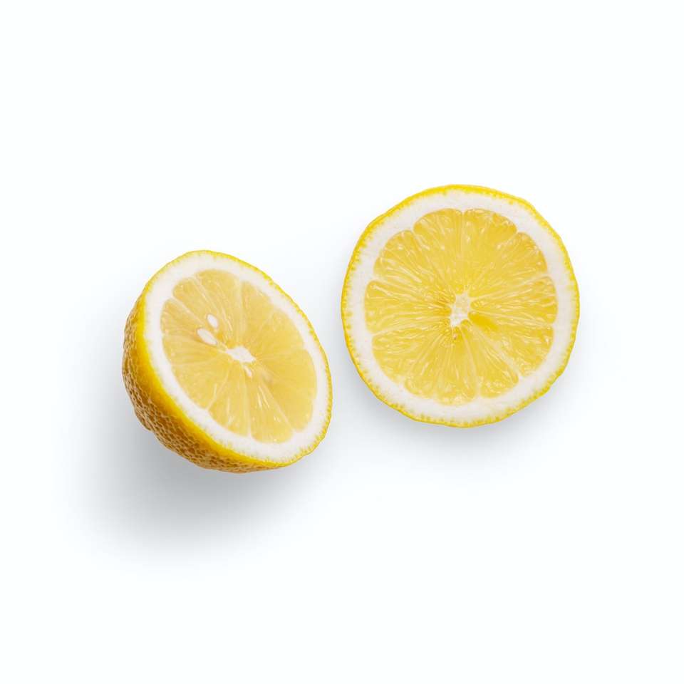 白い背景の上のスライスしたオレンジ色の果物 スライディングパズル・オンライン