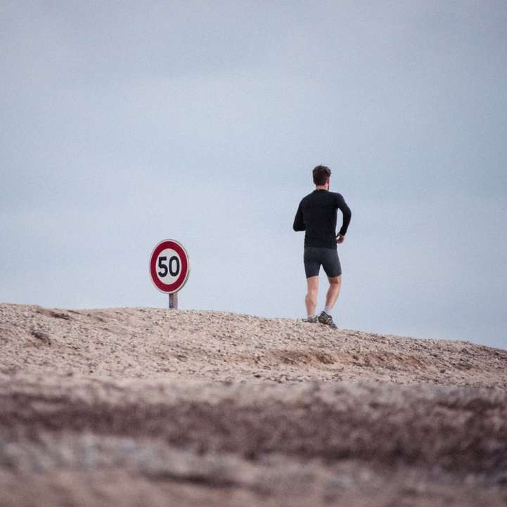 Guy jogging by sign online puzzle