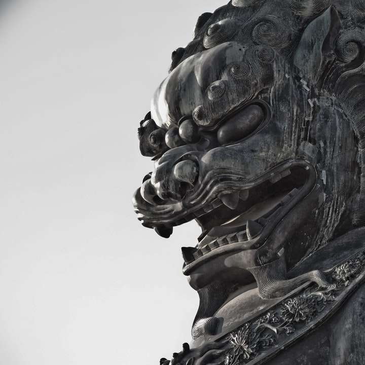 szara statua betonowa fu fu puzzle przesuwne online