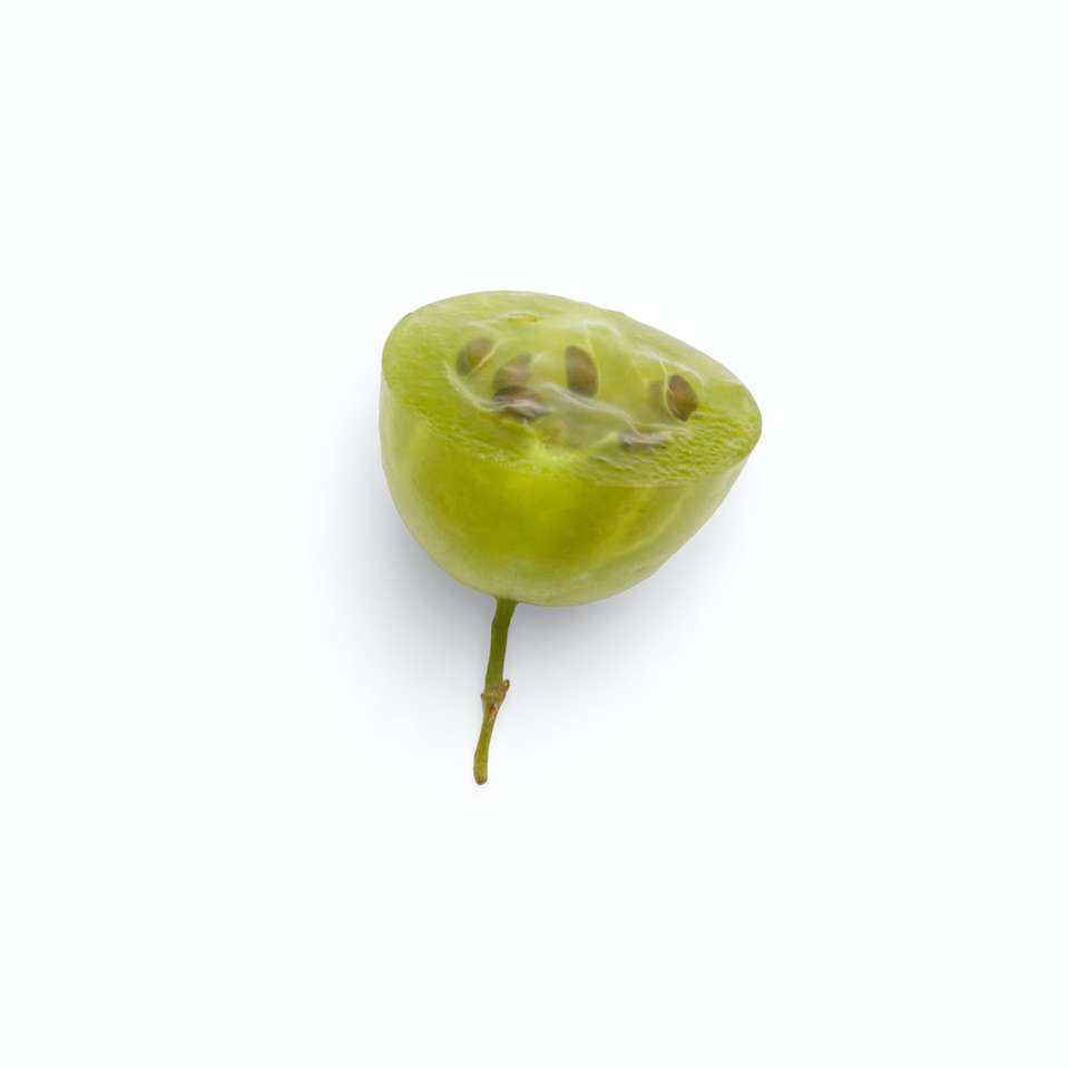 grüne Apfelfrucht auf weißem Hintergrund Online-Puzzle