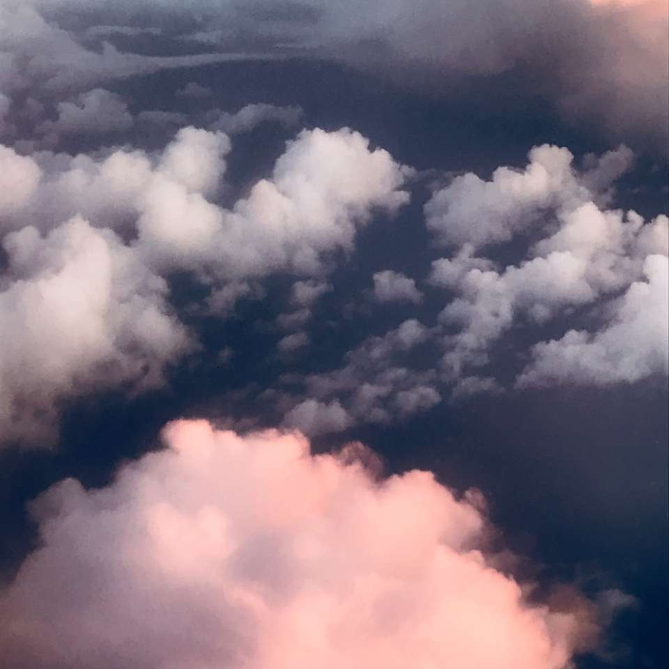 foto aérea do mar de nuvens puzzle deslizante online