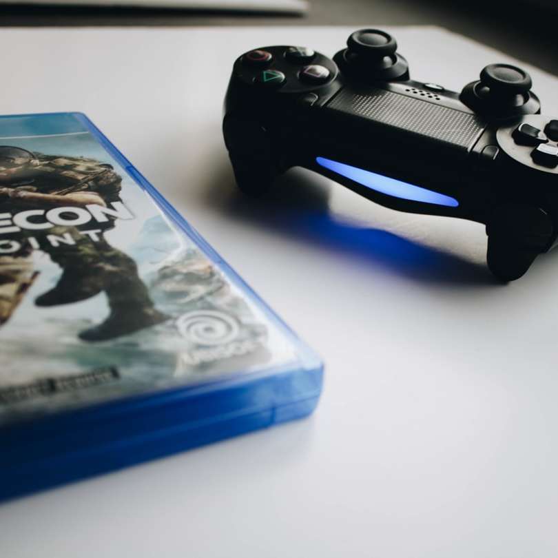 svarta Sony PS4-styrenheter glidande pussel online