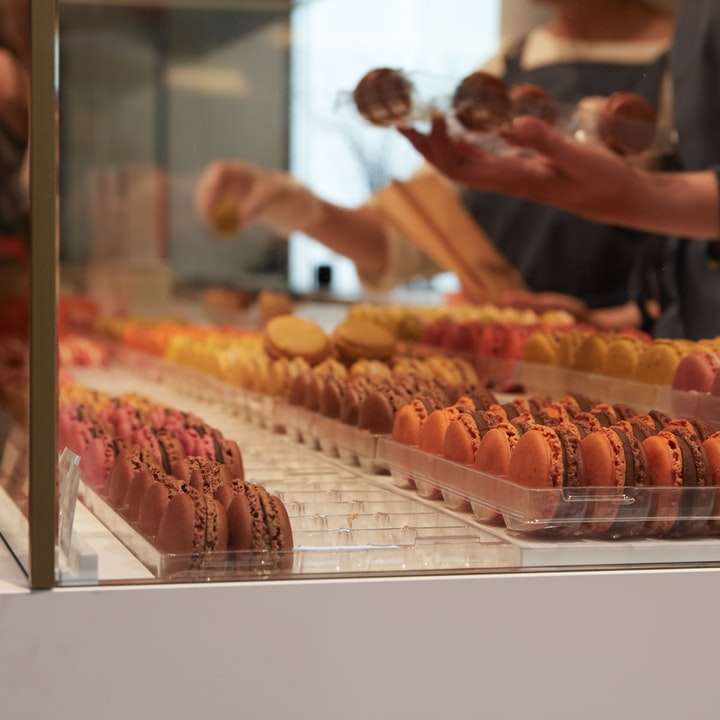 Macaroons in the showcase of a pastry shop, France sliding puzzle online