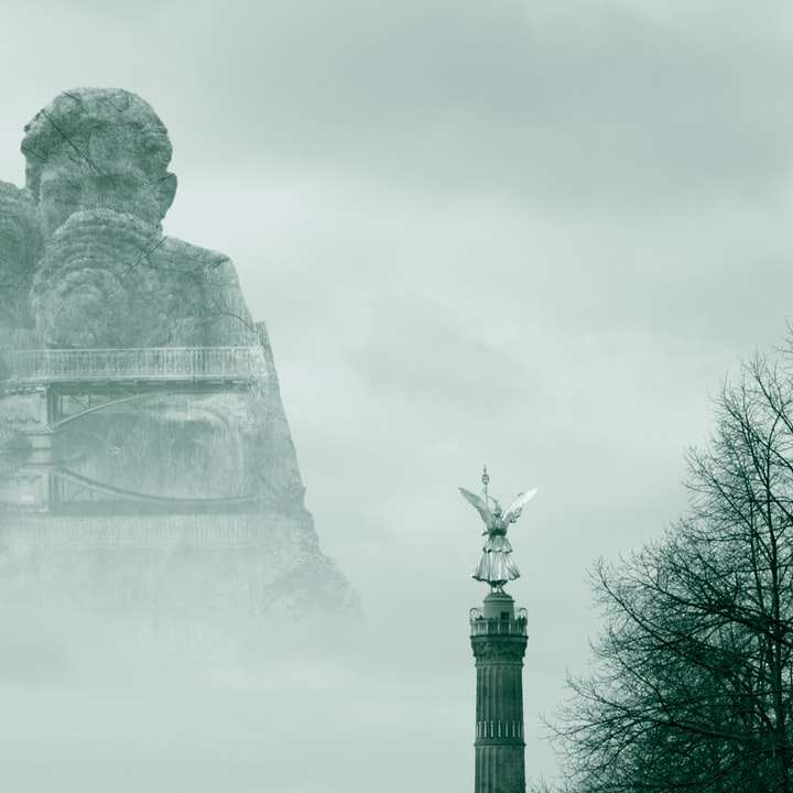 grå manliga monument glidande pussel online