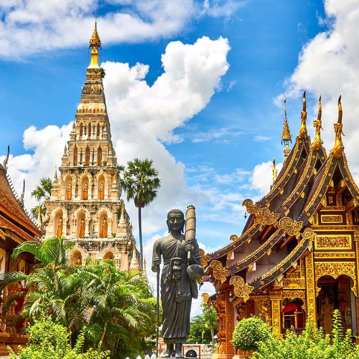 standing statue and temples landmark during daytime online puzzle