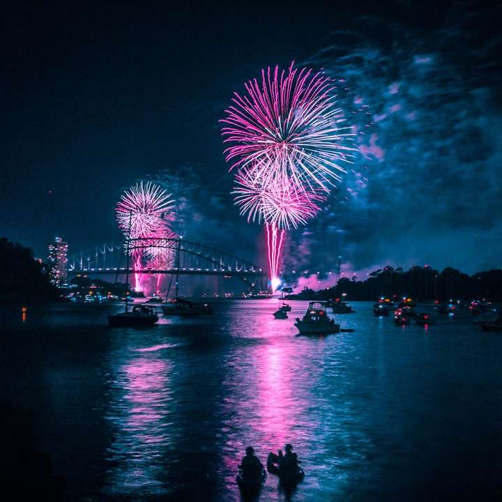 fireworks above long bridge at night-time online puzzle
