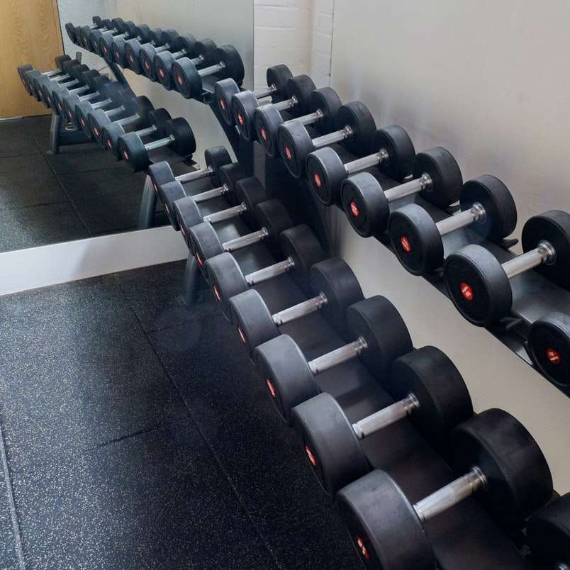 black and gray dumbbells on black bench online puzzle