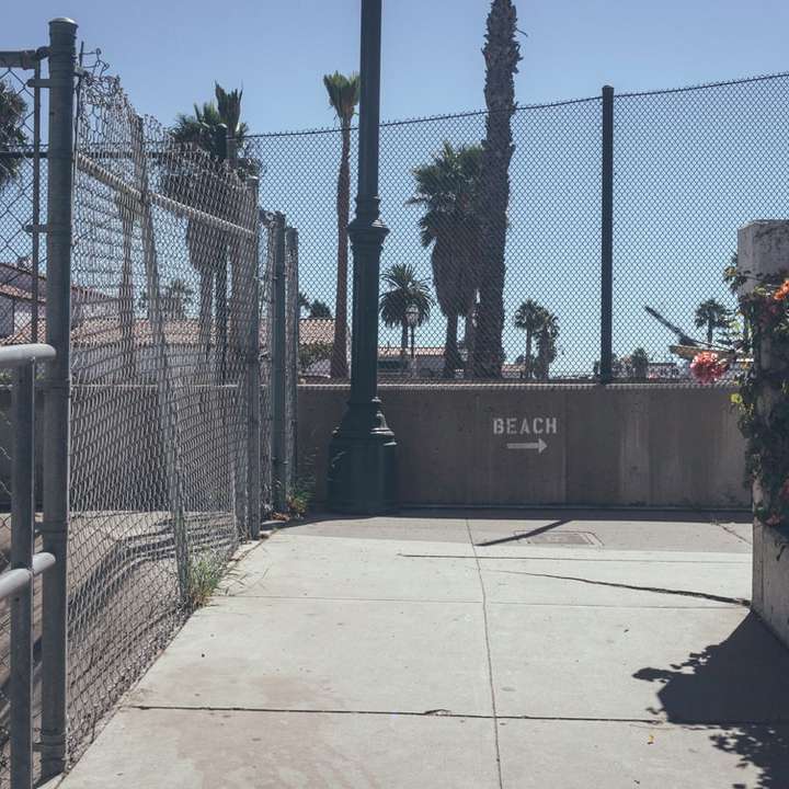 Urban fenced sidewalk sliding puzzle online