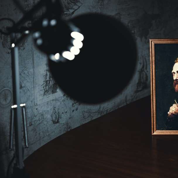 Bearded man portrait and lamp sliding puzzle online
