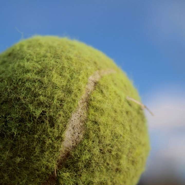 Bola de tênis velha puzzle deslizante online