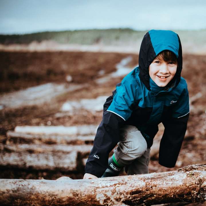 boy climbing on tree stump sliding puzzle online