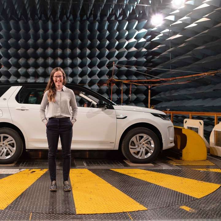 Female electronics engineer in anechoic chamber sliding puzzle online