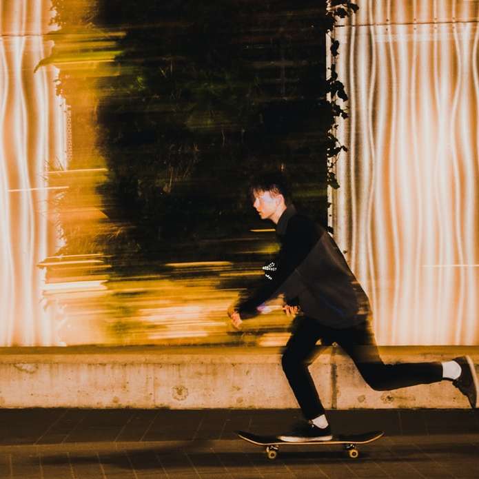 man op skateboard schuifpuzzel online