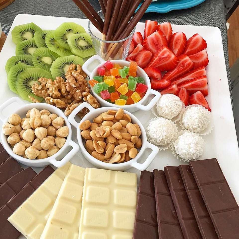 frutta, noci, cioccolato ... puzzle scorrevole online