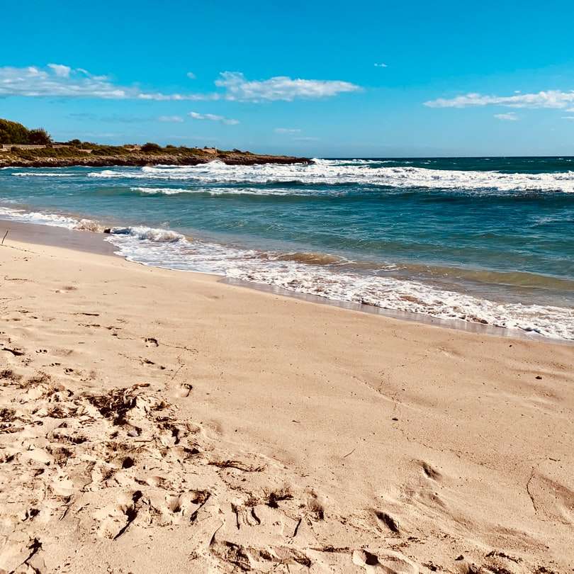 spiaggia di sabbia marrone puzzle scorrevole online