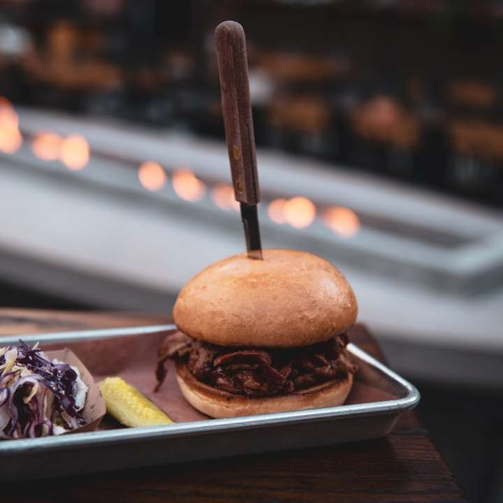 burger beside coleslaw on tray sliding puzzle online
