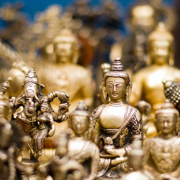 Zlatá figurka Gautama Buddhy posuvné puzzle online