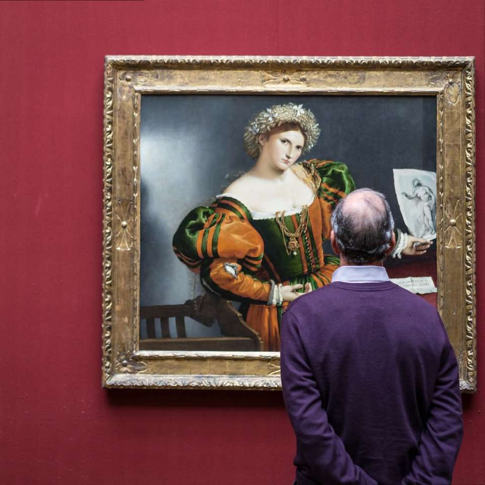 Frau im lila Langarmhemd, das neben Mann steht Schiebepuzzle online