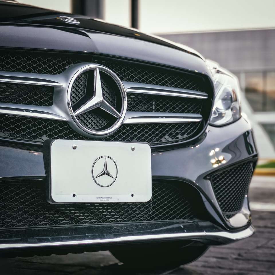 black Mercedes-Benz sedan sliding puzzle online