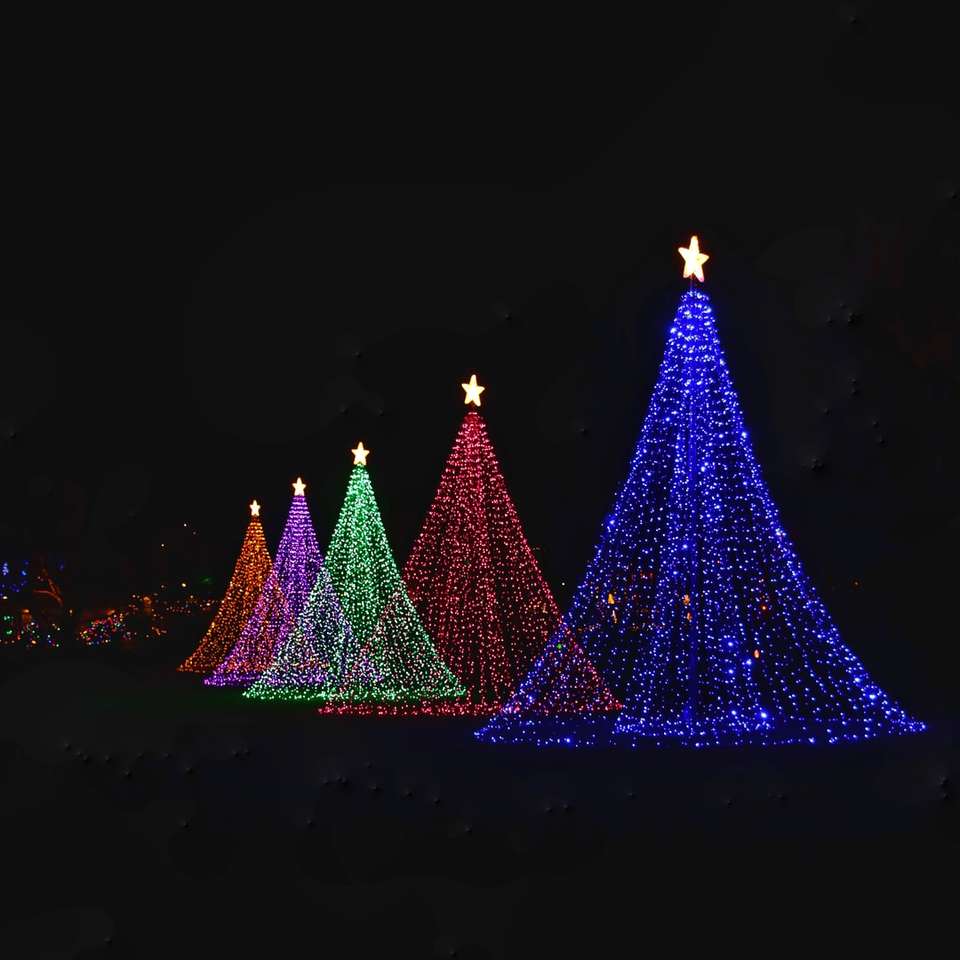 purple and blue christmas tree with string lights sliding puzzle online