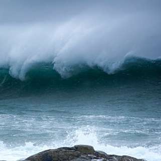 fotografering av havsvågor under dagtid Pussel online