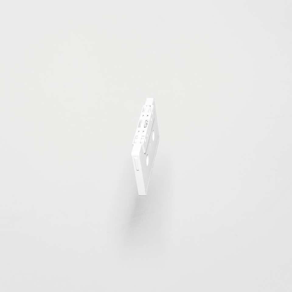 white cassette tape with white background online puzzle