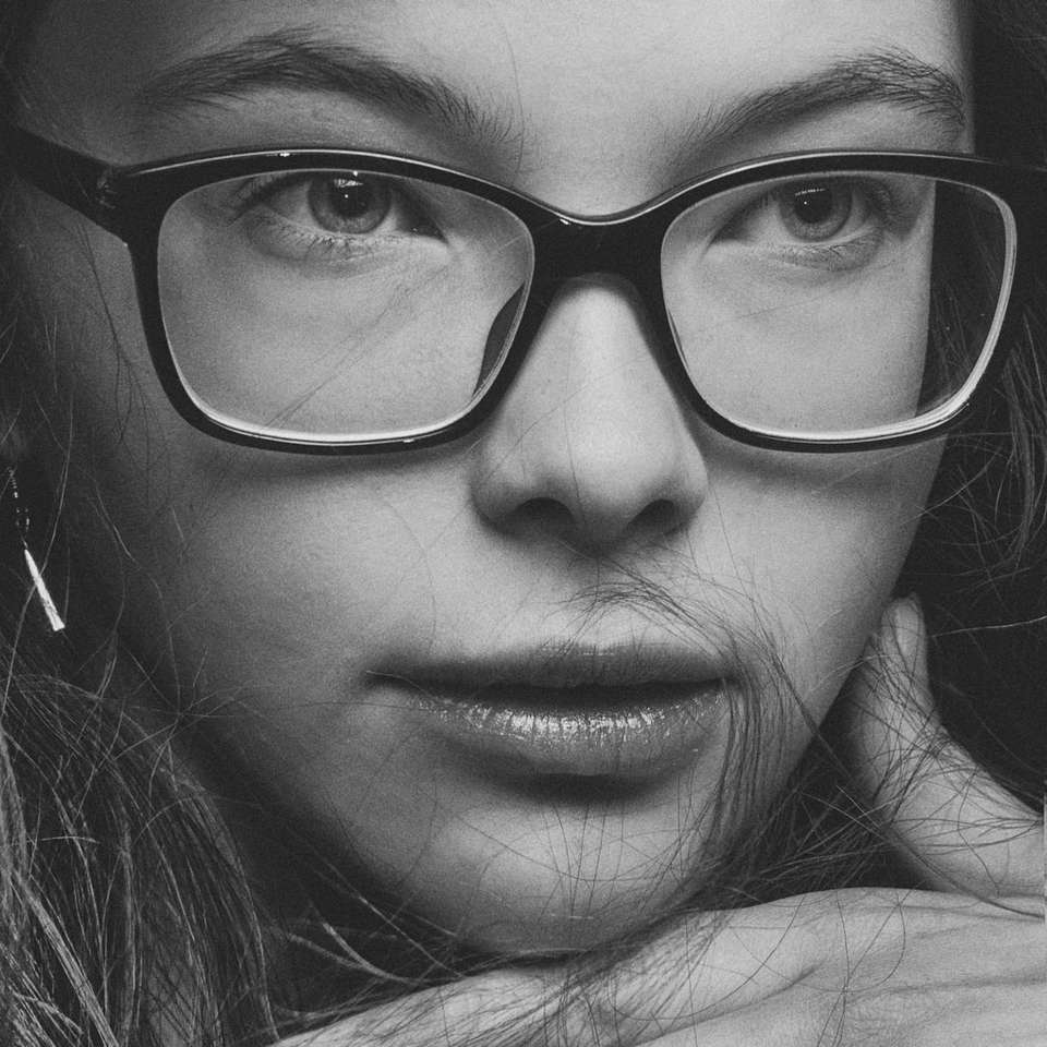 woman wearing black framed eyeglasses online puzzle