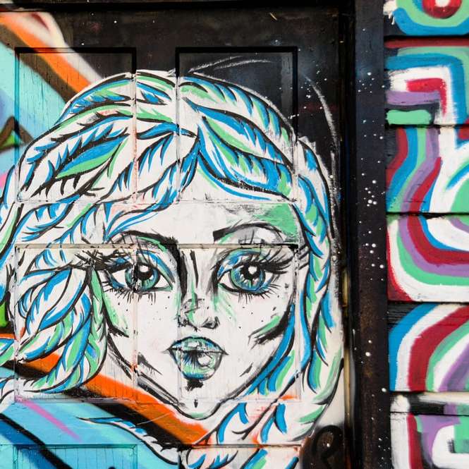 blue and white haired woman graffiti sliding puzzle online