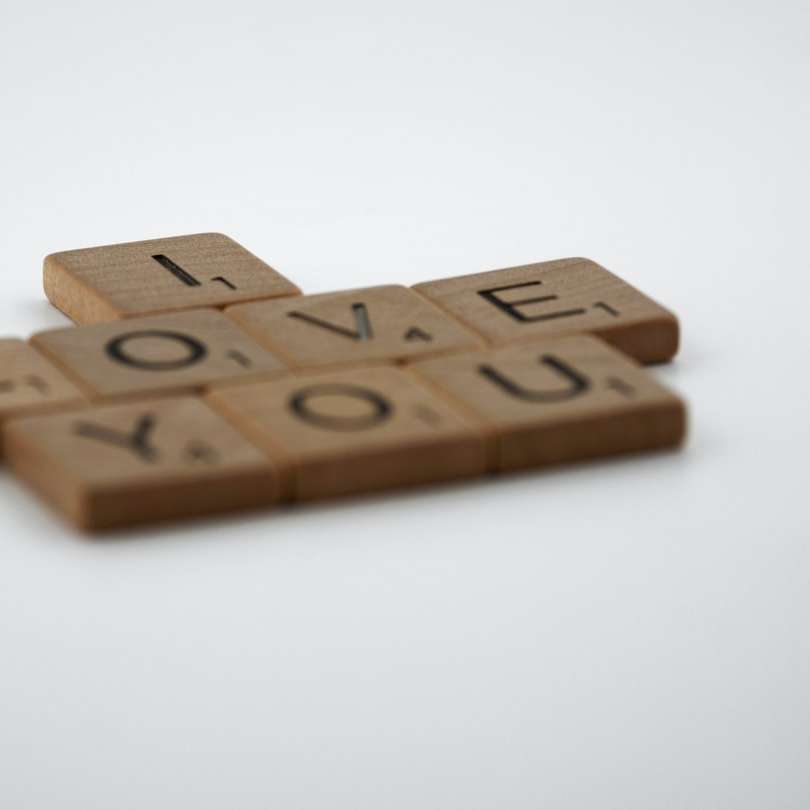brown wooden letter t-letter sliding puzzle online