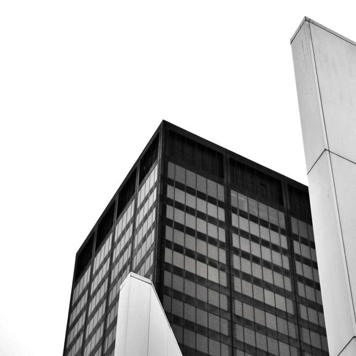 grayscale photo of concrete building sliding puzzle online