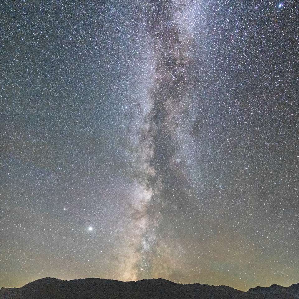 silueta muntelui sub noapte înstelată alunecare puzzle online