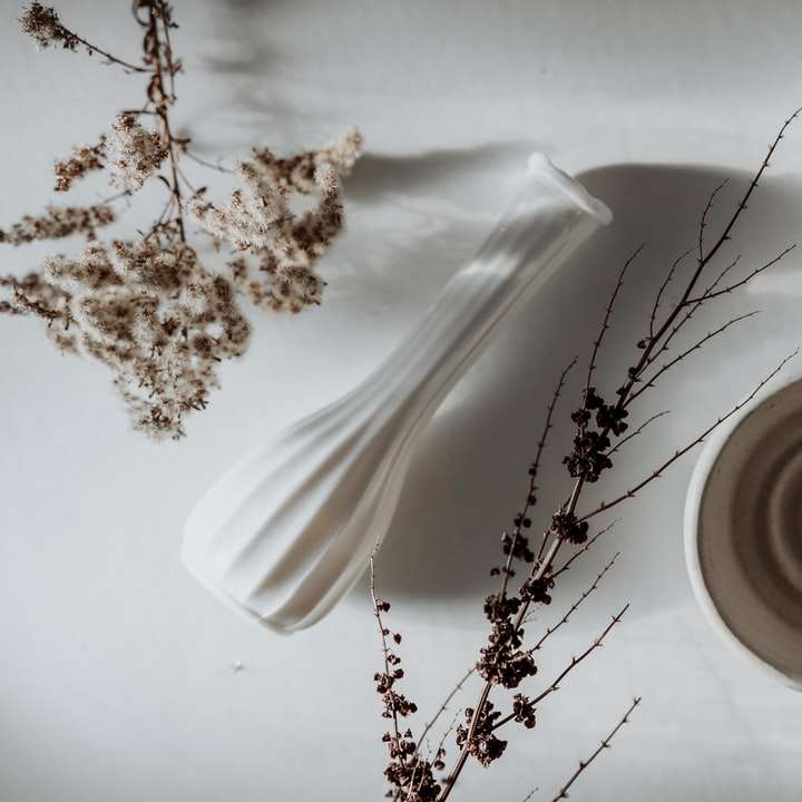 tazza in ceramica bianca sul piattino in ceramica bianca puzzle online