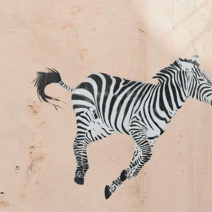 zebra djurhuvud på brun sand glidande pussel online