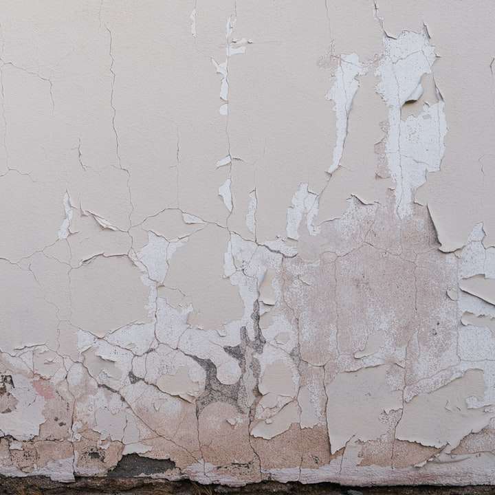 muro bianco con pietra marrone e bianca puzzle scorrevole online