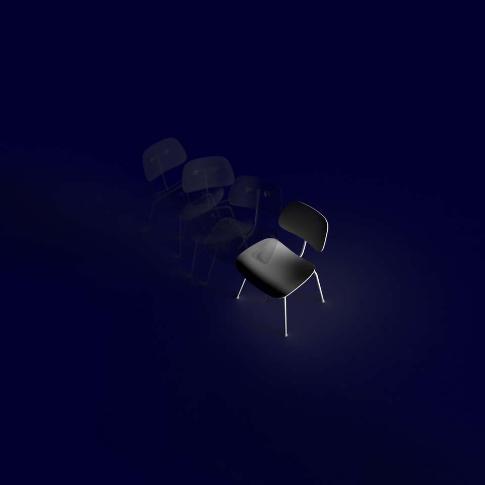 gråskalefoto av stolar på vitt rum Pussel online