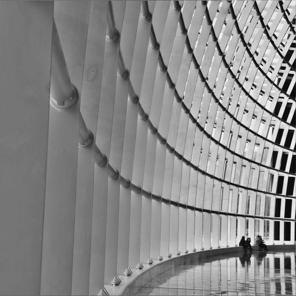 grayscale photo of people walking on spiral stairs online puzzle