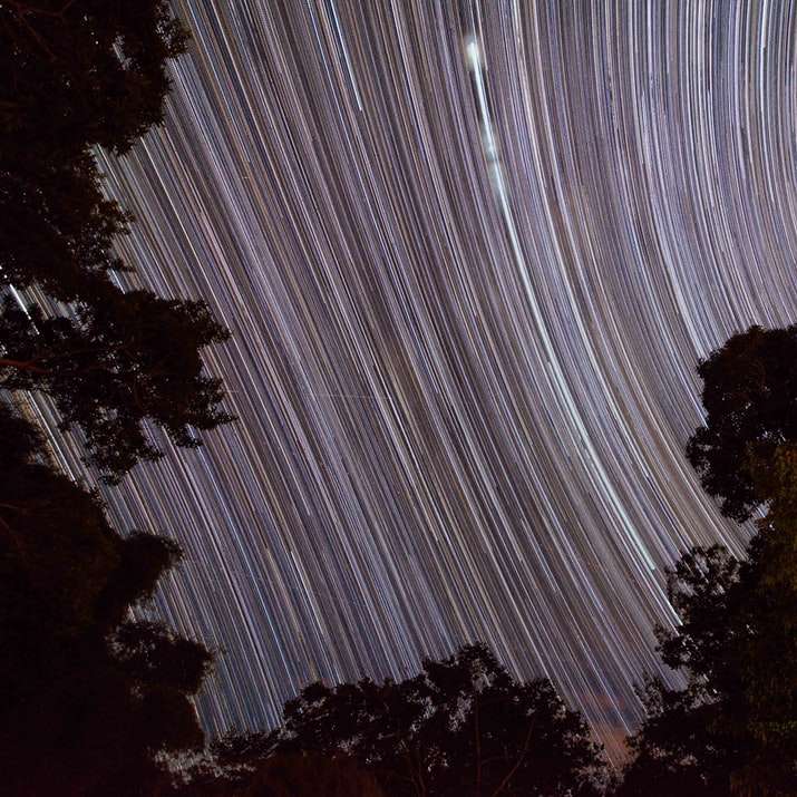 tidsfördröjningsfotografering av stjärnor på himlen under dagtid glidande pussel online