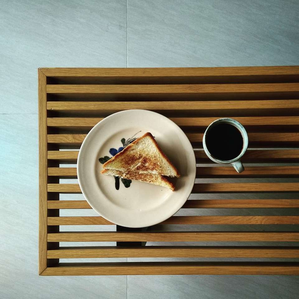 brown bread on white ceramic plate beside white ceramic mug sliding puzzle online