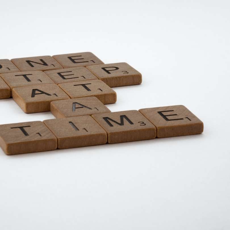 brown wooden blocks on white surface sliding puzzle online