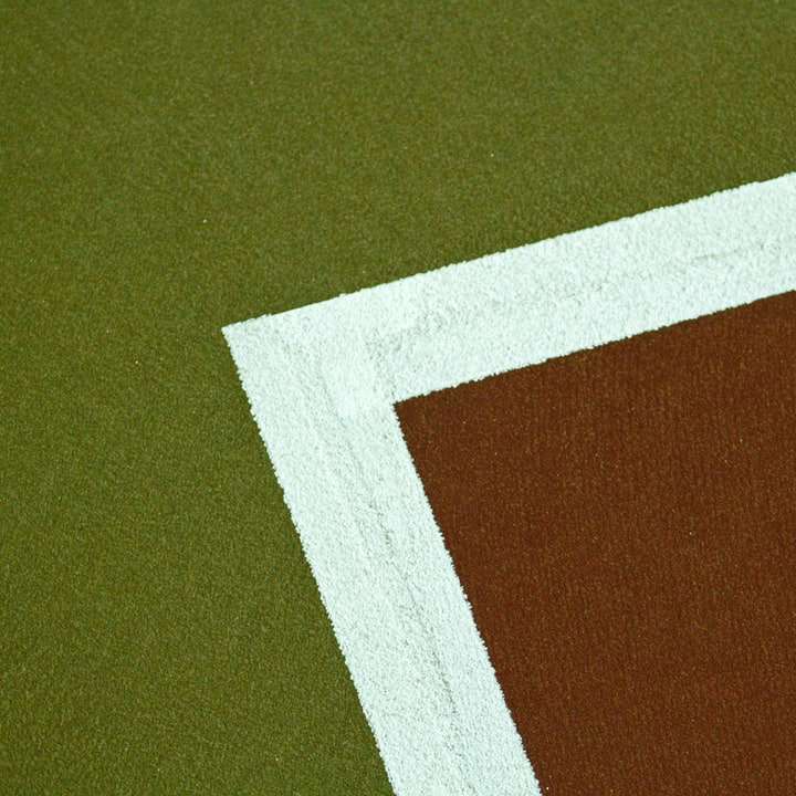 tecido vermelho e branco em tecido verde puzzle deslizante online