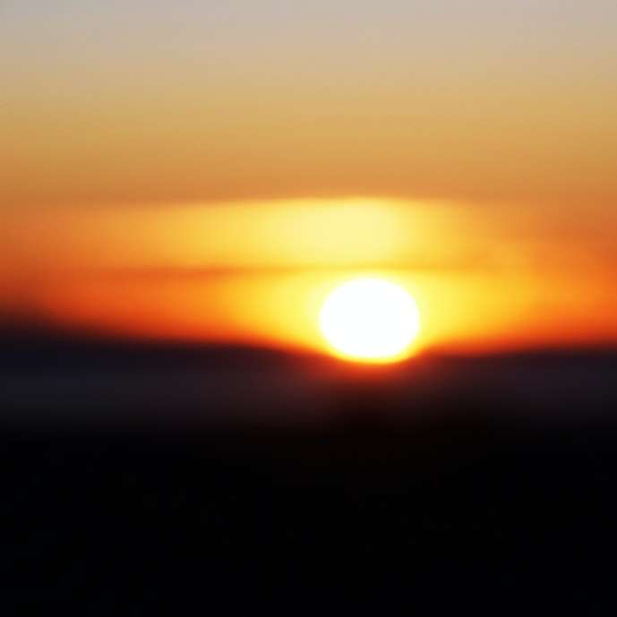 puesta de sol sobre el horizonte rompecabezas en línea