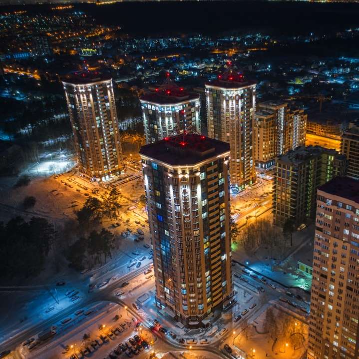 high rise buildings during night time online puzzle