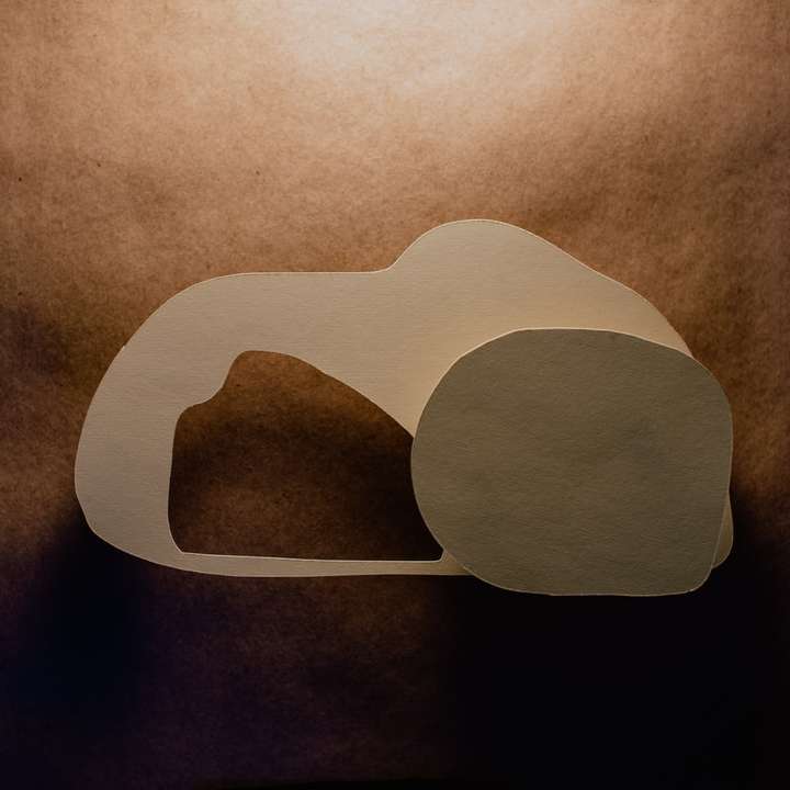 white heart shaped paper cut out sliding puzzle online