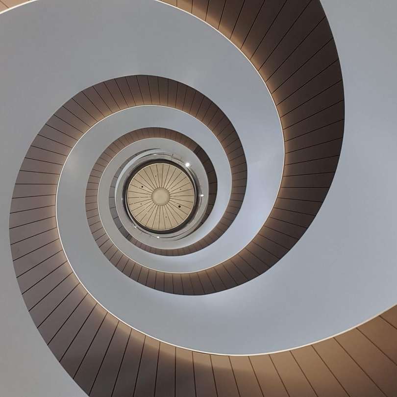 white spiral stairs with white ceiling sliding puzzle online