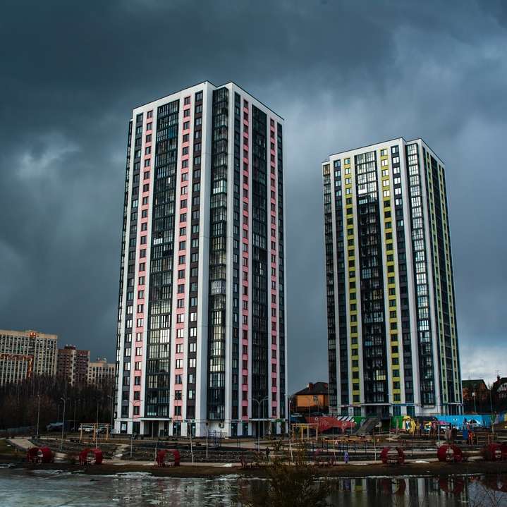 high rise building near body of water during daytime sliding puzzle online
